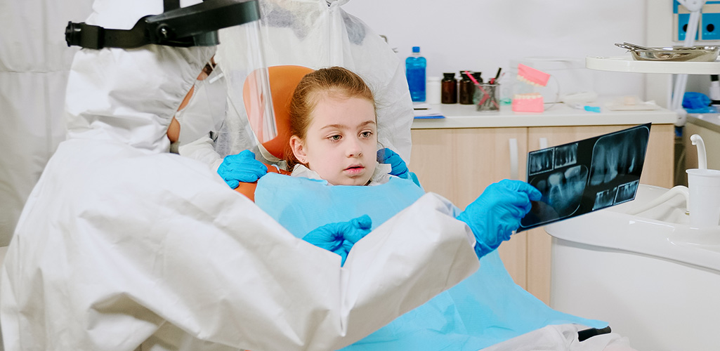 Child receiving dental care